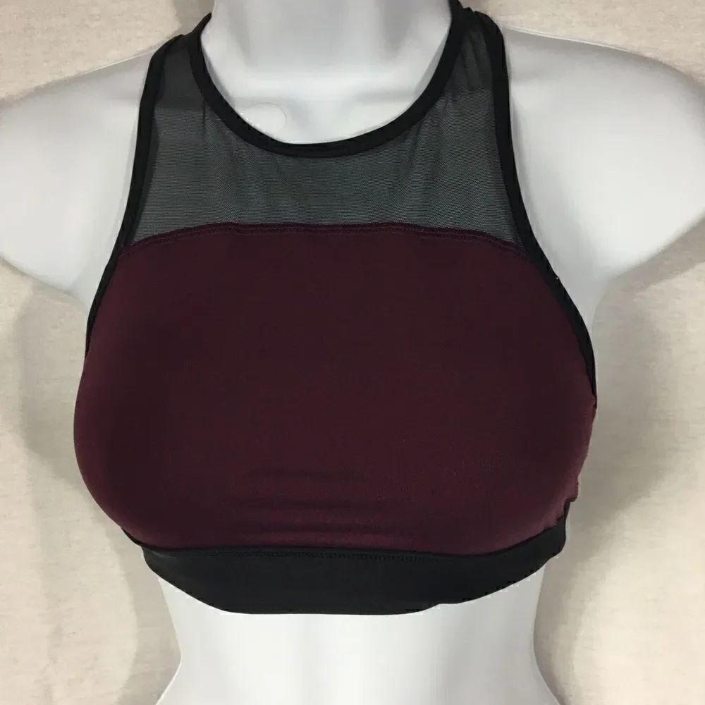 Pink brand XS purple wine colored body with black trim around Razorback back